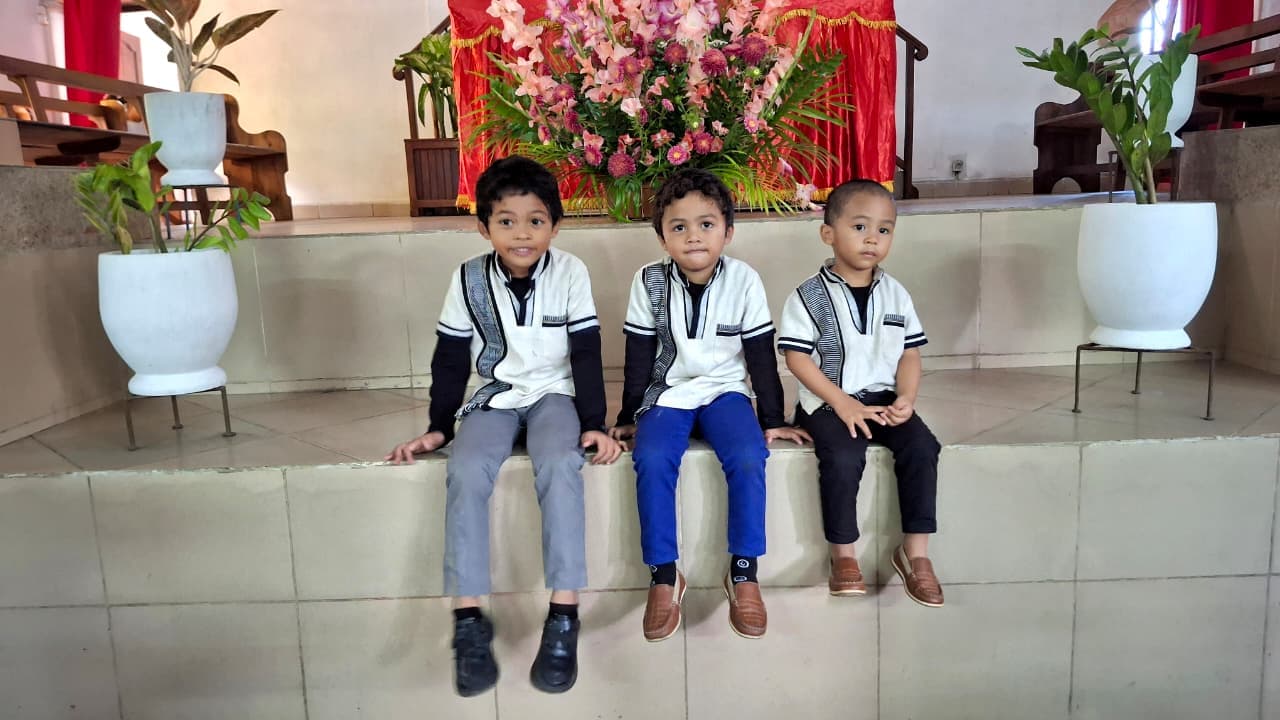 Alfa, Manda and Isaiah, the three boys whose names inspired AMI